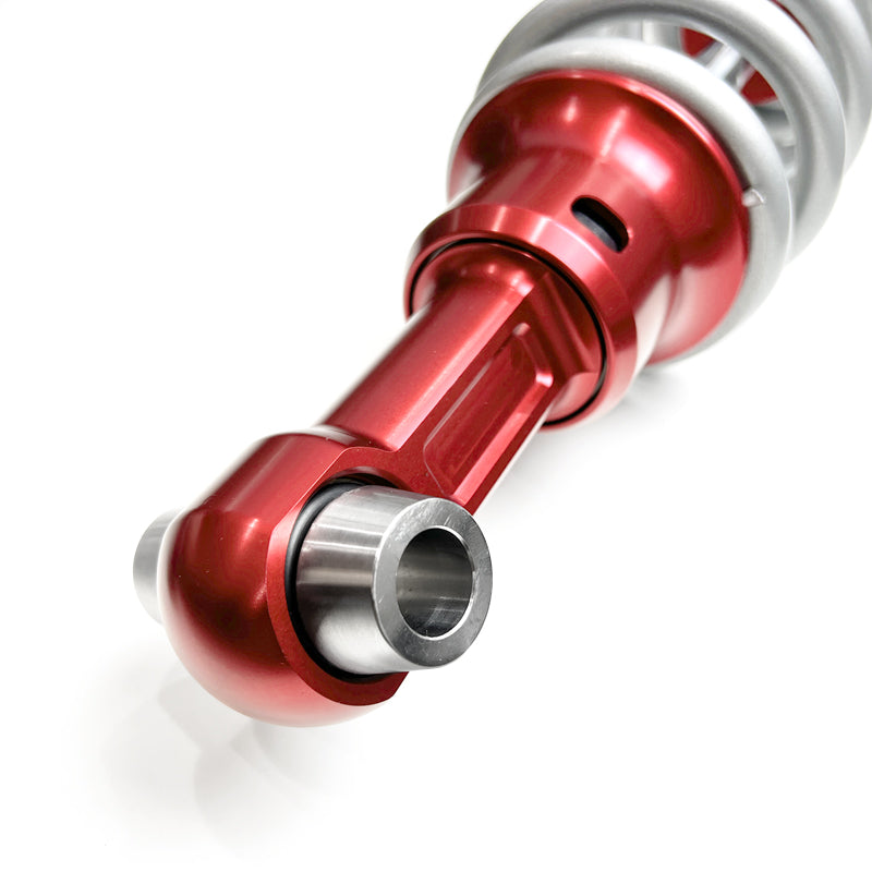 Ford Bronco Ride Shocks Coilovers are designed for long lasting high performance. This rear coilover shock has a large bearing and spacers to mount to the axle. Bright red aluminum components allow for corrosion free off-road use.