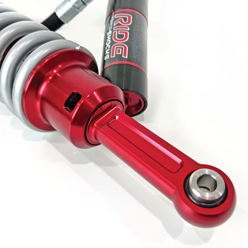 Ride Shocks front coilover lower mount for Toyota 4Runner. These aluminum red anodized parts are durable and designed to last for a long time. 4Runner front coilover is equipped with an FK rod end bearing.