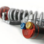 Ride Shocks coilover with dual piston adjusters. The bright red anodizing on Ride Shocks looks great along with the high and low speed compression adjuster knobs. Ride Shocks coilovers are pre-tuned for specific weight ranges to help your Tacoma drive smooth.
