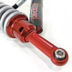 Ride Shocks front coilover lower mount for Toyota Tacoma. These aluminum red anodized parts are durable and designed to last for a long time. 4Runner front coilover is equipped with an FK rod end bearing.